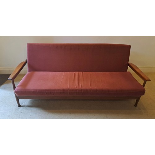 59 - A Guy Rogers three piece suite comprising a sofa bed 77 h x 202 w x 100cm d and two reclining chairs... 