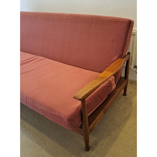 59 - A Guy Rogers three piece suite comprising a sofa bed 77 h x 202 w x 100cm d and two reclining chairs... 