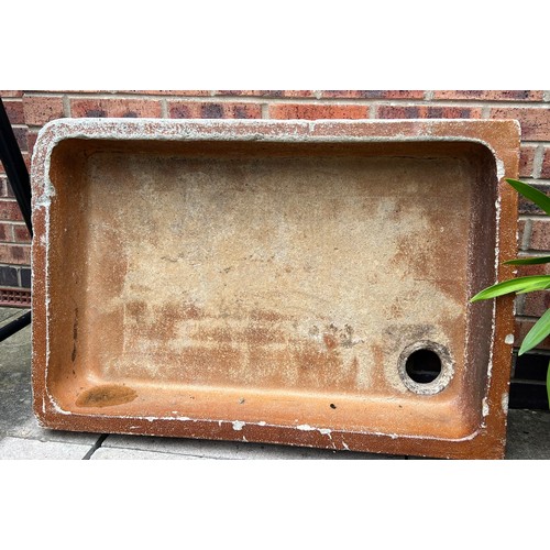 1352 - A 19thC treacle glazed sink. 92cm w x 61cm d x 14cm h.