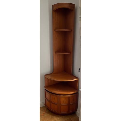 61 - A teak Parker Knoll corner cupboard with light to top, shelves and cupboard to base. 195cm h x 65cm ... 