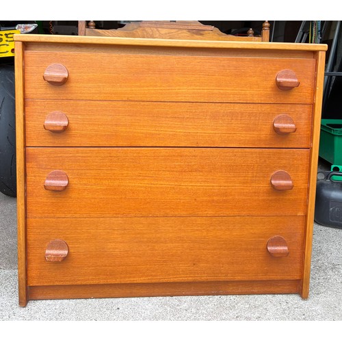 62 - A mid 20thC teak Stag chest of four drawers. 76cm w x 43cm d x 67cm h.