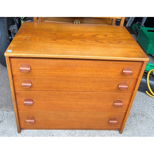 62 - A mid 20thC teak Stag chest of four drawers. 76cm w x 43cm d x 67cm h.