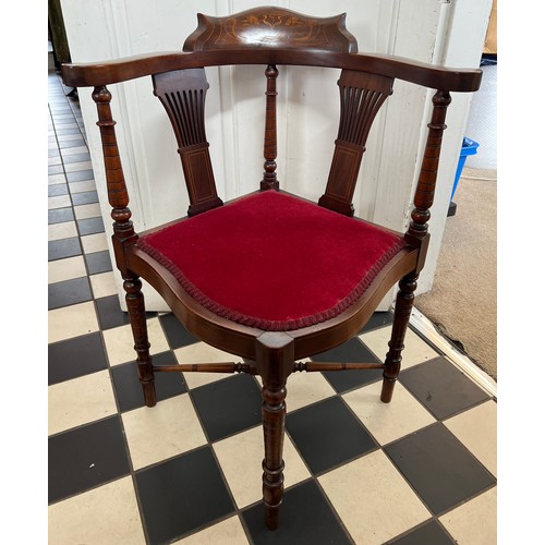 70 - An Edwardian mahogany and inlaid corner chair. Art Nouveau decoration to top rail.