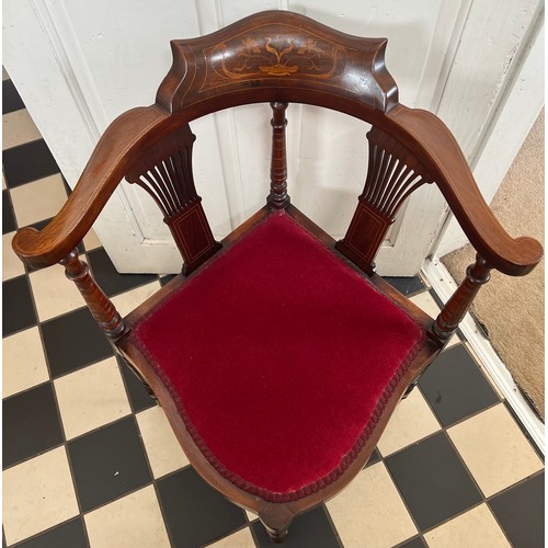 70 - An Edwardian mahogany and inlaid corner chair. Art Nouveau decoration to top rail.