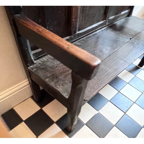 71 - A mainly 18thC oak settle. With fitted cushion in hunting pattern. 116cm w x 74cm w. Height to seat ... 