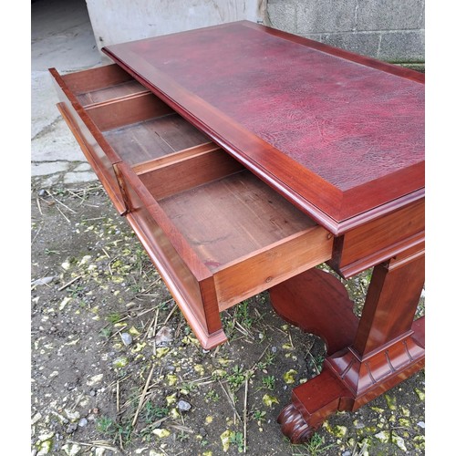 72 - A 19thC mahogany desk with three drawers to the front and red leather top. 125cm w x 59cm d x 46cm h... 