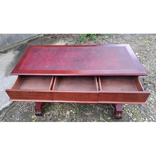 72 - A 19thC mahogany desk with three drawers to the front and red leather top. 125cm w x 59cm d x 46cm h... 