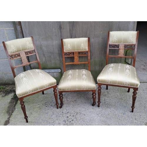 73 - Three Edwardian rosewood and inlaid chairs, a pair and one single nursing chair.