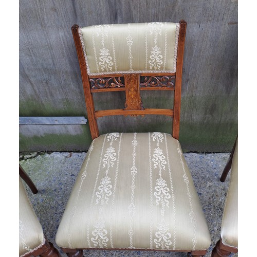 73 - Three Edwardian rosewood and inlaid chairs, a pair and one single nursing chair.