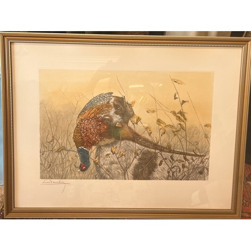 1291 - Léon Danchin pencil signed print of a spaniel with a pheasant in its mouth. 55cm x 73cm.