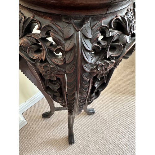 79 - Oriental style carved plant stand with marble circular insert to top approx 92cm h x 28cm diameter.