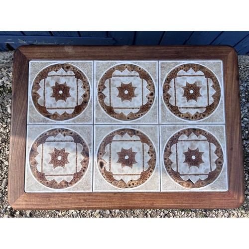 81 - A mid 20thC teak tiled top coffee table 71cm x 51cm x 41cm h.