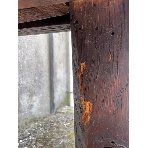 85 - An early 19thC oak side table with single drawer to front and brass drop handles.