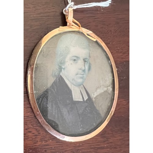 1265 - Early 19thC British school, on ivory of a clergymen within gilt frame. s.s 6 x 4.5cm.