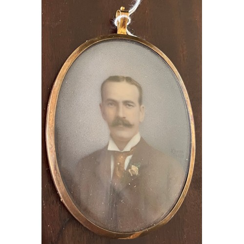 1269 - A Victorian miniature portrait, painted by A. James, 1897, of a gentleman in a tie in gilt frame, on... 