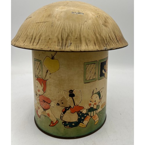 1257 - A William Crawford & Sons Ltd Lucie Attwell’s Fairy House Biscuit 19cm h and Money Box together with... 