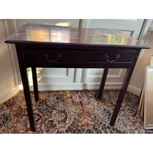 88 - A Georgian mahogany side table with single drawer to front with original handles. Canted corners to ... 