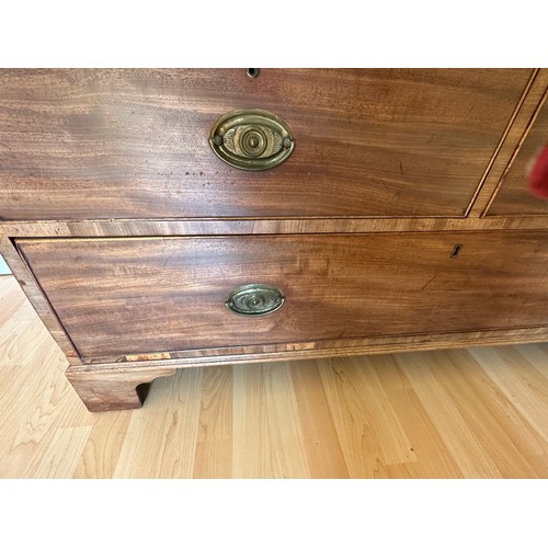 92 - An early 19thC linen press. 2 doors over 3 drawers. 122 w x 42 d x 186cm h.