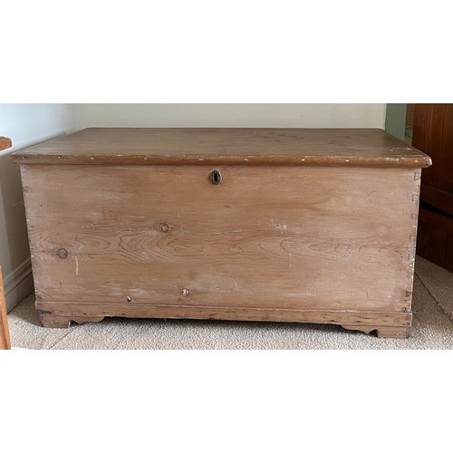 93 - A 19thC pine blanket box with metal carrying handles and interior candle box.109cm w x 47cm d x 52cm... 