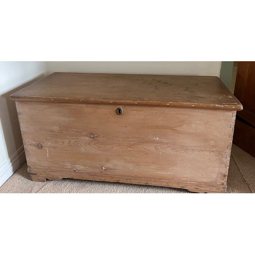 93 - A 19thC pine blanket box with metal carrying handles and interior candle box.109cm w x 47cm d x 52cm... 