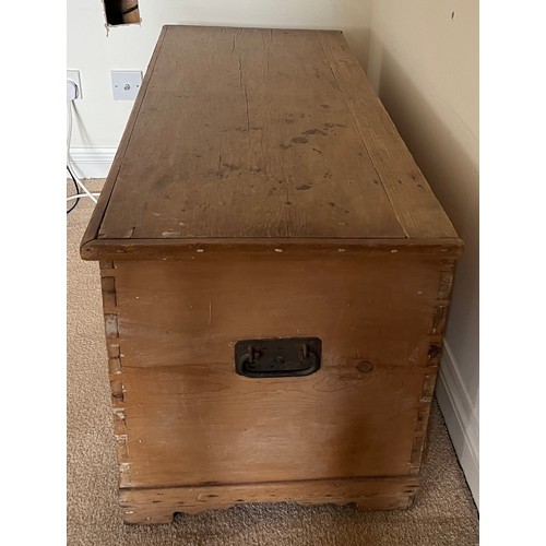 93 - A 19thC pine blanket box with metal carrying handles and interior candle box.109cm w x 47cm d x 52cm... 