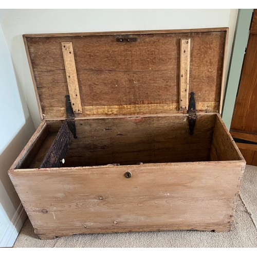 93 - A 19thC pine blanket box with metal carrying handles and interior candle box.109cm w x 47cm d x 52cm... 