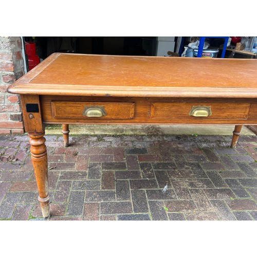 96 - Edwardian oak desk with three drawers to the front and faux leather top. 167cm w x 90cm d x 80cm h.