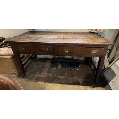 98 - A 19thC oak side table with two drawers and original handles. 153cm w x 55cm d x 78cm h.