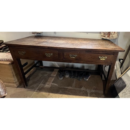 98 - A 19thC oak side table with two drawers and original handles. 153cm w x 55cm d x 78cm h.