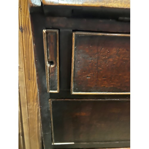 101 - A 19thC mahogany fall front bureau with well fitted interior. Four graduating drawers with ivory esc... 