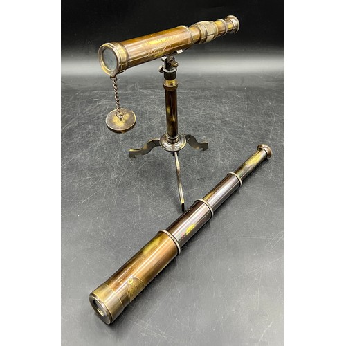 20A - Two replica brass telescopes, a pedestal desk top telescope and a four drawer naval telescope both i... 