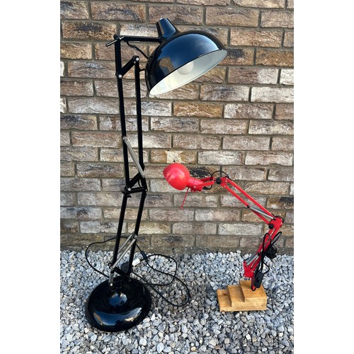 20B - Two vintage Anglepoise lamps. Black with weighted base, approx 112cm and red on a wooden three step ... 