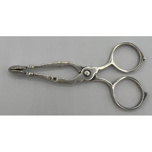 70A - A pair of hallmarked silver sugar nips of diminutive proportions, 8cms long. Sheffield 1902 maker Ja... 