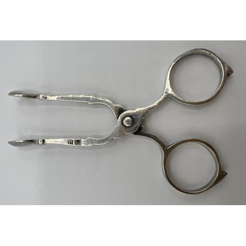 70A - A pair of hallmarked silver sugar nips of diminutive proportions, 8cms long. Sheffield 1902 maker Ja... 