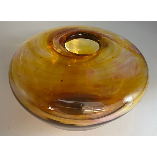 105A - A hand blown studio amber coloured glass vase circa 1970�s. Approx. 9cm h x 15cm diameter.