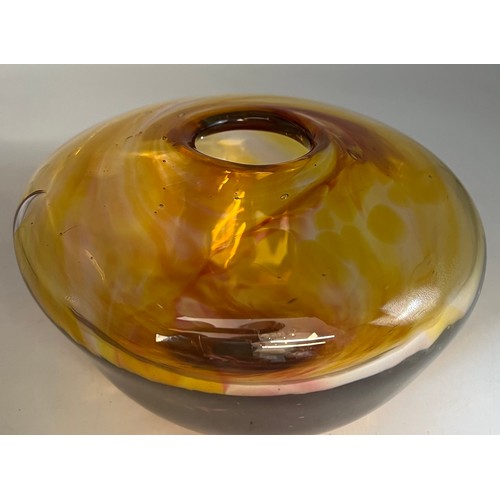 105A - A hand blown studio amber coloured glass vase circa 1970�s. Approx. 9cm h x 15cm diameter.