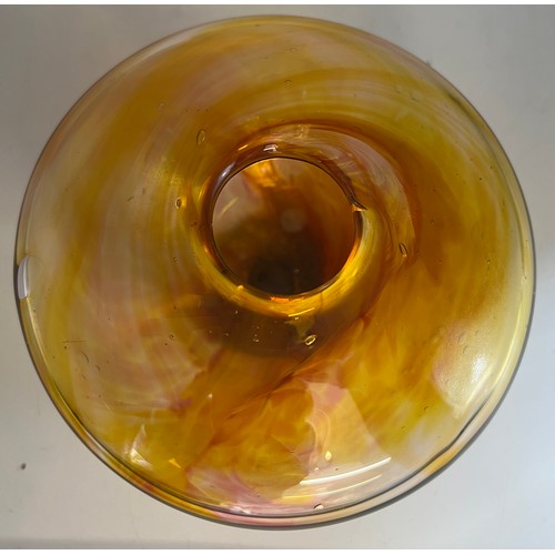 105A - A hand blown studio amber coloured glass vase circa 1970�s. Approx. 9cm h x 15cm diameter.