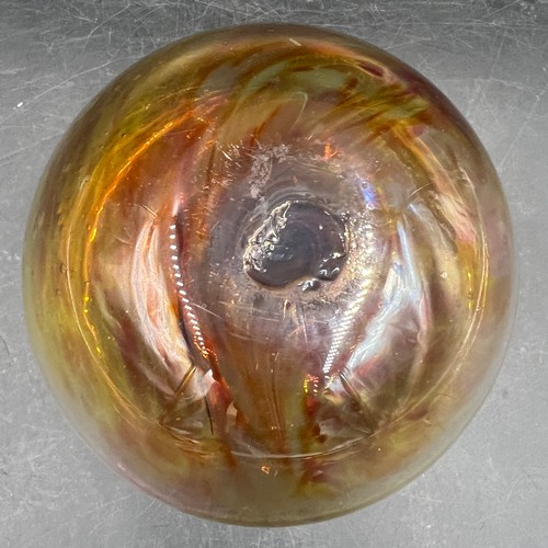 105A - A hand blown studio amber coloured glass vase circa 1970�s. Approx. 9cm h x 15cm diameter.