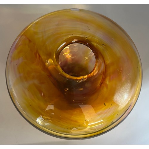 105A - A hand blown studio amber coloured glass vase circa 1970�s. Approx. 9cm h x 15cm diameter.