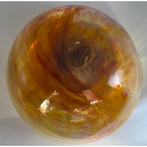 105A - A hand blown studio amber coloured glass vase circa 1970�s. Approx. 9cm h x 15cm diameter.