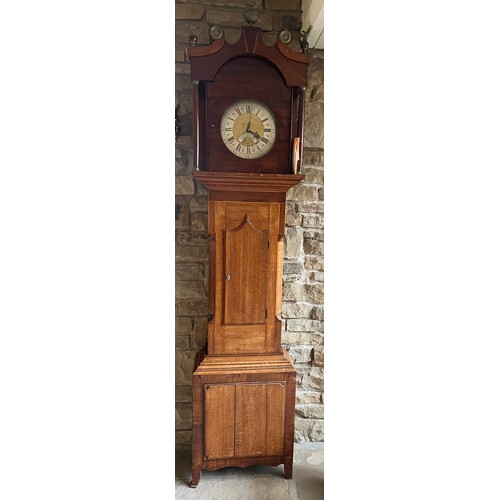 1263 - An oak longcase clock with brass face reading John Gilbertson Ripon 222 x 52cm.