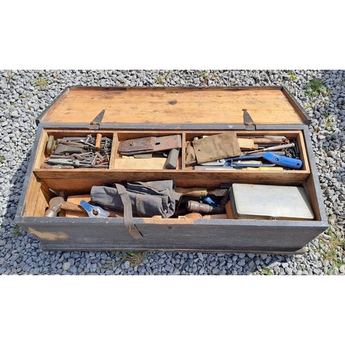 1327 - A vintage pine toolbox full of tools. 95cm w x 37cm d x 38cm h.