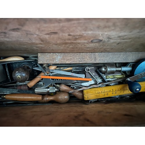 1327 - A vintage pine toolbox full of tools. 95cm w x 37cm d x 38cm h.