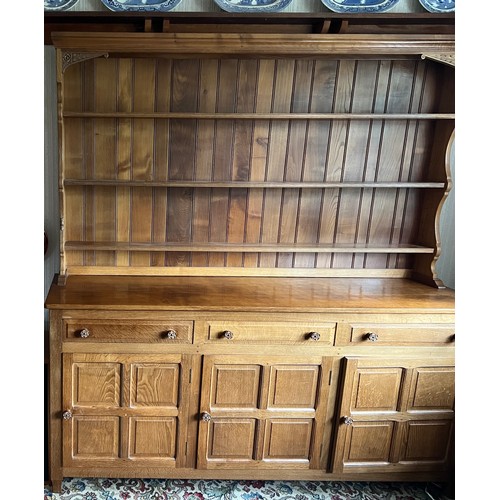 102 - A Colin Almack Beaverman dresser with Yorkshire rose detail and added top and signature beaver. 181c... 