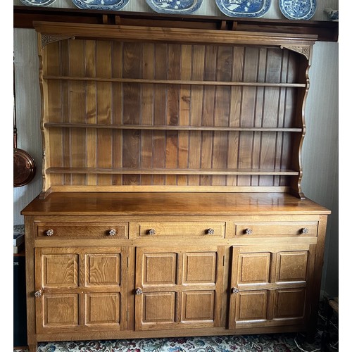 102 - A Colin Almack Beaverman dresser with Yorkshire rose detail and added top and signature beaver. 181c... 