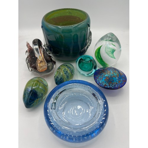 319 - Twentieth century glass to include Caithness ‘Swish’ paperweight, mushroom, vase in blue/green tones... 