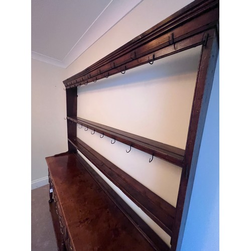 1 - An 18thC oak dresser and rack with original iron hooks, 165 w x 195 h x 41cm d.