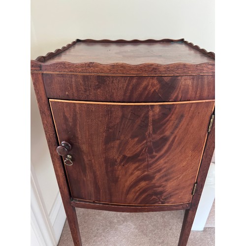 3 - A mahogany bedside cabinet with satinwood toes. 34.5 x 35.5 x 81cm h.