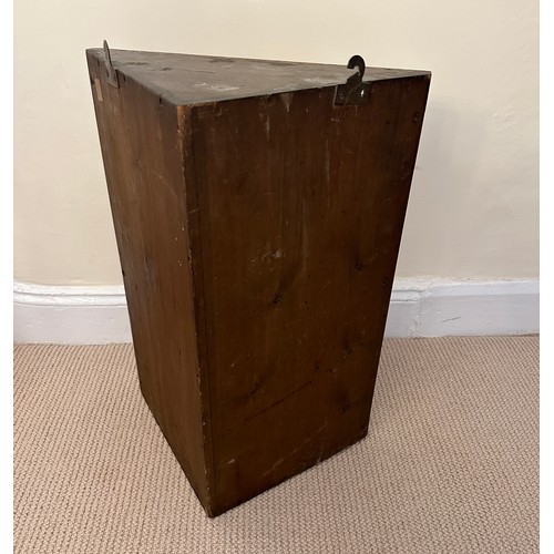 39 - A heavily carved, early 20thC oak single door corner cupboard. . With single shelf to interior. 38 w... 