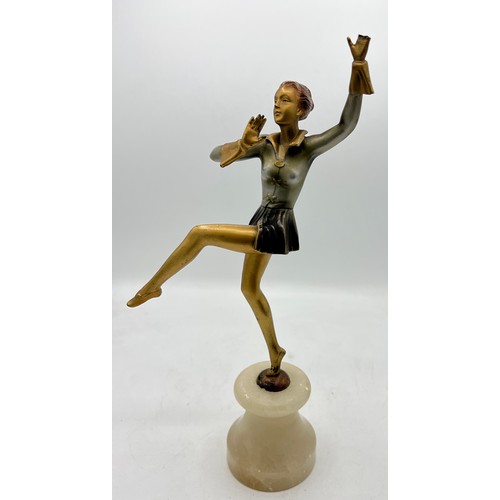 1328 - Art Deco figure of a dancing girl on onyx plinth. 31cm h.